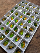 Load image into Gallery viewer, DESTASH: 72pc pack Swarovski 3230 12x7 Fern Green Topaz Drops
